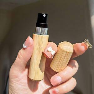 Bouteille de parfum en <span class=keywords><strong>bambou</strong></span> personnalisée Bouteille vaporisateur atomiseur ronde portable Bouteille de supplément de parfum de <span class=keywords><strong>poche</strong></span> au format de voyage Produits uniques - Product Image 2