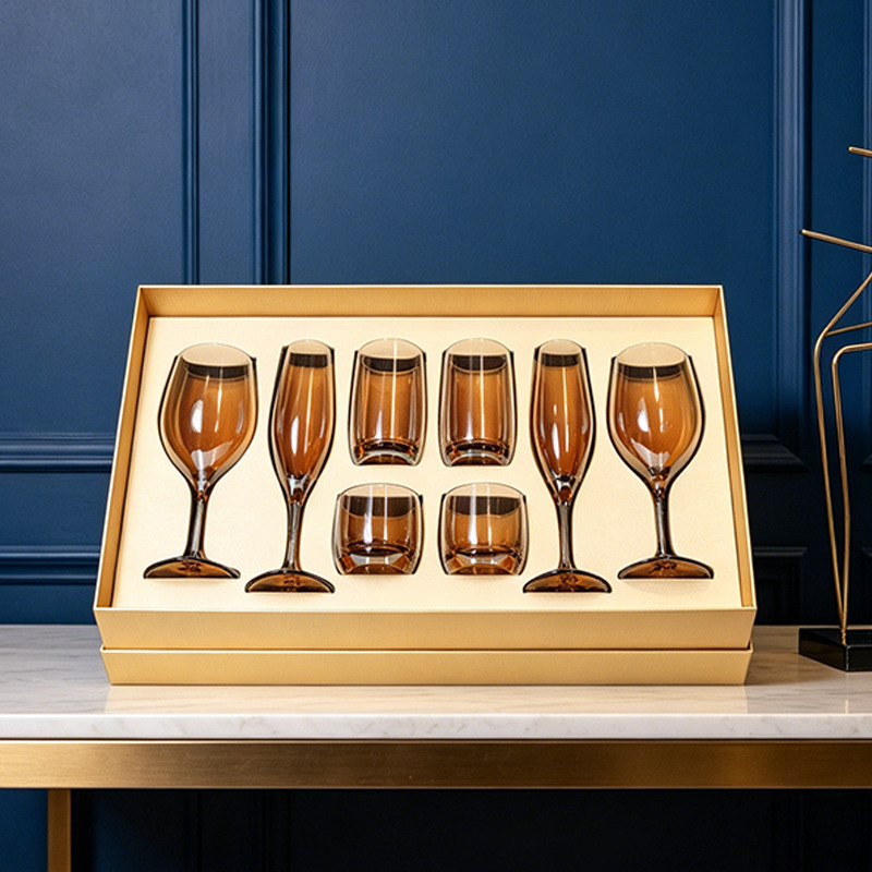 A set of eight dazzling amber champagne and red wine beverage glasses
