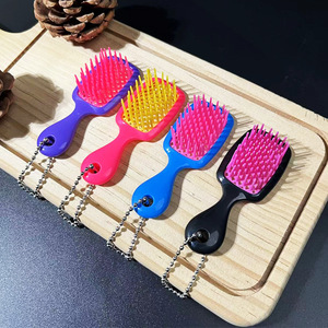 Mini brosse à cheveux 3D de haute qualité avec coussin, démêlante et massante, porte-clés et pendentif de sac - Product Image 1