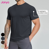 Kaos Lengan Pendek Pria Janya Campuran Wol Warna Solid Ramah Kulit Bernapas Menyerap Keringat dengan Belahan Samping untuk Kebugaran Luar Ruangan Cepat Kering