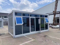 Maison en conteneur à assemblage rapide pour usage en magasin Bureau mobile à mur de verre préfabriqué avec véranda de loisirs Villa de loisirs pratique
