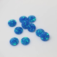 Opale synthétique de couleur bleue, ronde et brillante