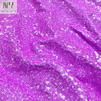 Tissu tricoté élastique en polyester Nanyee, brodé de micro-paillettes violettes, tissu tricoté à paillettes violettes
