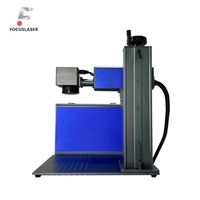 Machine de marquage laser à fibre Focuslaser 30W/50W/60W/100W Jpt/Raycus Mopa, gravure et découpe laser couleur pour l'acier inoxydable