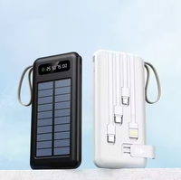 Banque d'énergie solaire 20000 Mah de conception de lanière intelligente noire et blanche avec support pour téléphone portable 2 sorties USB 1 à 4 sorties de câble de charge