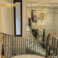 Escalier en colimaçon intérieur courbé Bisini avec balustrade en laiton et cuivre et base en cristal pour villa et hôtel – Proposition de conception gratuite