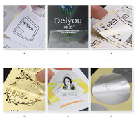 Autocollant d'étiquette étanche personnalisé en PVC Feuilles de papier Rouleau d'autocollant pour bouteille cosmétique