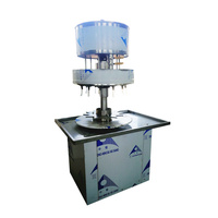 Machine de remplissage de liquide Machine de remplissage rotative automatique de produits alcalins et machine de remplissage de bouteilles d'alcool de capsulage 50ml
