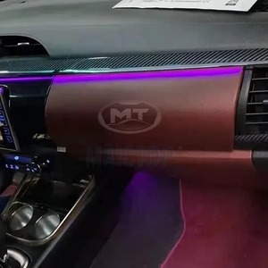 Interior <b>trim</b> for 2016-2021 Toyota Hilux Revo, including dashboard and four-<b>door</b> switch <b>trim</b> panels. - Product Image 3