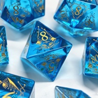 LuxeRoll – Jeu de dés en verre cristal bleu ciel, 7 pièces, motif chat gravé, dés polyédriques, chiffres en encre dorée, pour DND RPG et jeux de table