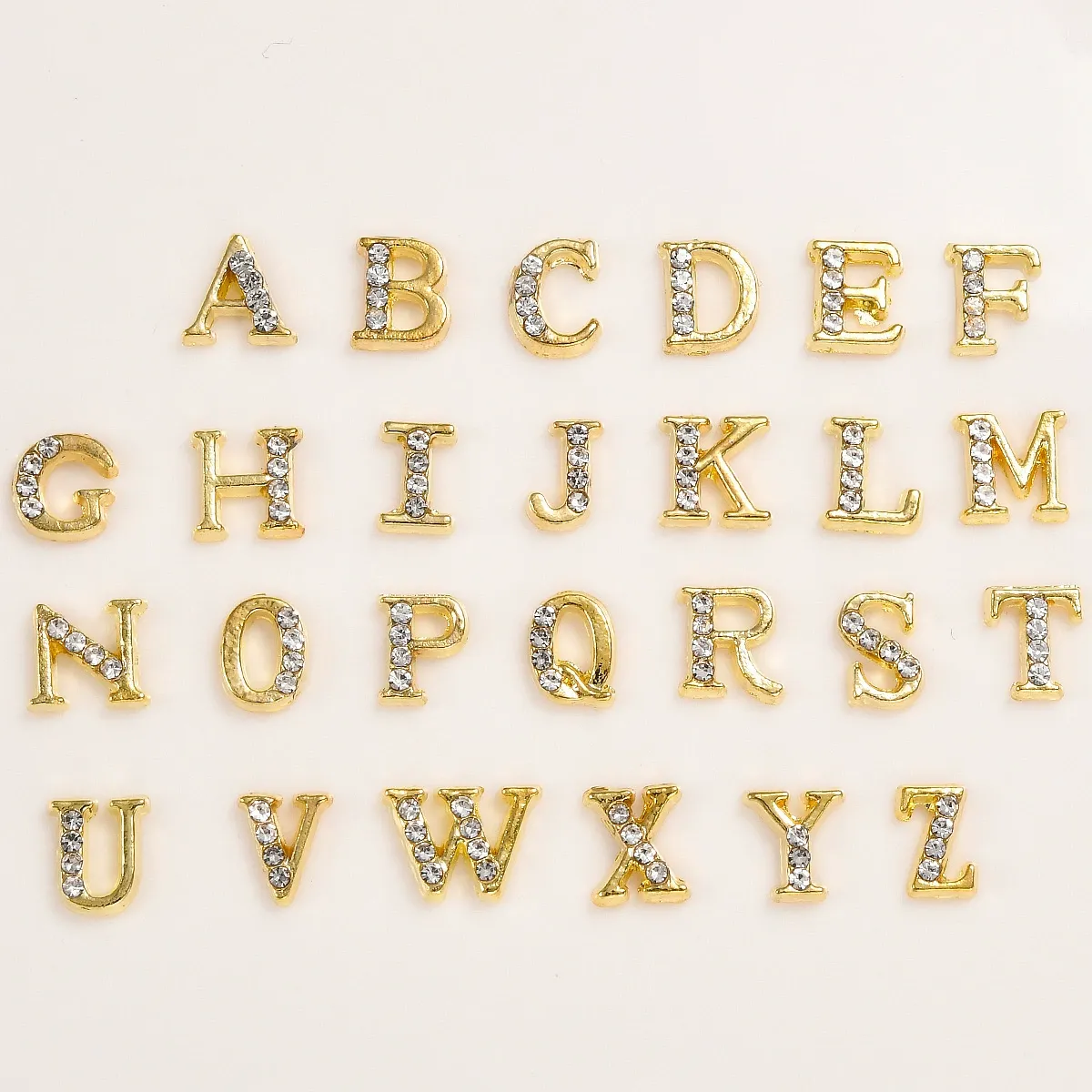 Juego de letras doradas