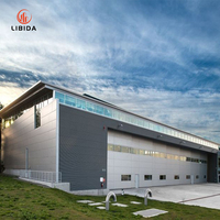 Bâtiment d'atelier industriel moderne personnalisable avec structure en acier haute résistance, certifié CE, garantie 1 an pour charges lourdes