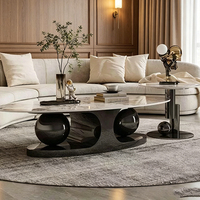Table basse ovale de luxe moderne en marbre avec base sphérique en acier inoxydable, table de salon design pour villa et appartement
