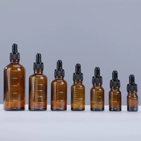 Bouteilles d'huile essentielle en verre brun de luxe 10ml 30ml, imprimées à l'écran, anti-lumière, avec compte-gouttes gradué et pipette pointue – Stock usine