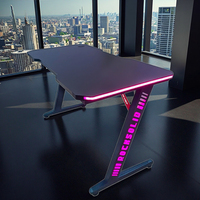 Bureau de jeu RVB moderne personnalisable Lumières LED Table d'ordinateur PC en forme de Z Design professionnel pour salle de jeu Fonction extensible