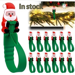 สินค้าใหม่ปี 2026 ตะขอแขวนพวงหรีดคริสต์มาส 12 ชิ้นสำหรับแขวนเสื้อคลุม และตะขอซิลิโคนสำหรับซานตาคลอส ขายส่ง - Product Image 3