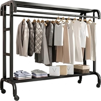 Porte-vêtements à roulettes robuste en métal noir à double barre, avec barres de suspension doubles, roues verrouillables et étagère de rangement inférieure