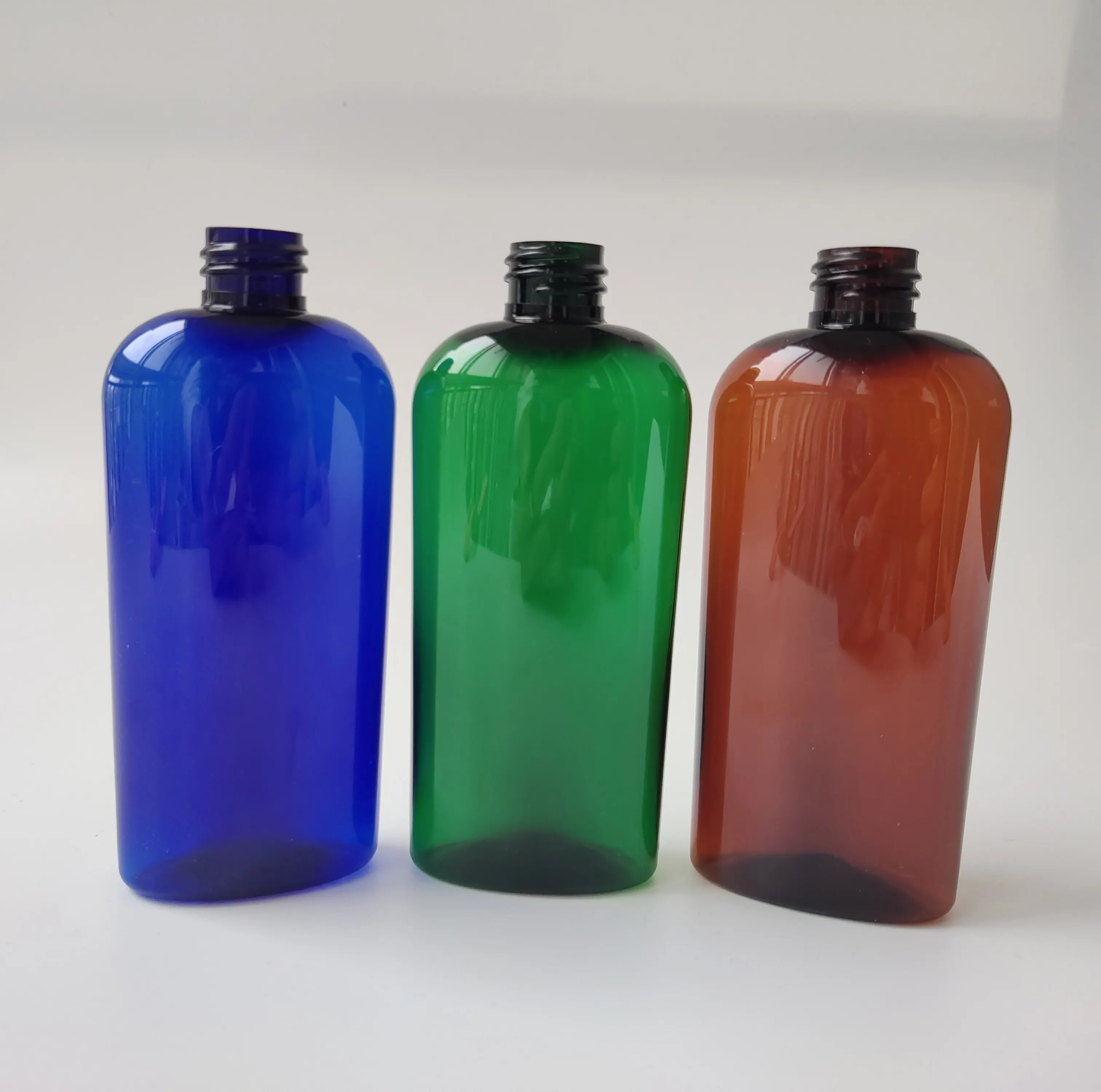 4oz 8oz Green Amber Cobalt Blue PET Cosmo Oval Bottles With Atomiser Spray Flip Top Disc Cap