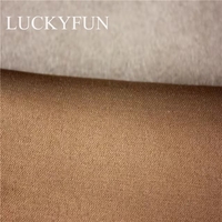 Les couleurs de tissu en daim polyester de haute qualité peuvent être personnalisées pour la fabrication de manteau