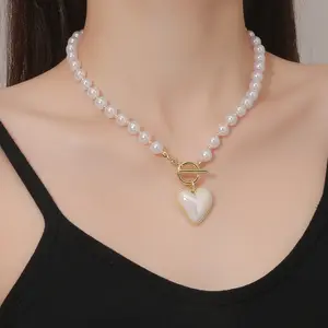 Gargantilla con colgante en forma de corazón para mujer y niña, joyería de lujo con cuentas de perlas