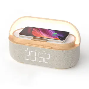 Trending Hot Products Creative Gift Multifunctional Touch Alarm Clocks Dimming Table Lamp 15W QI Wireless Charger Small Speaker