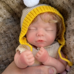 ตุ๊กตาเด็กเกิดใหม่ขนาด 10 นิ้ว ผมบลอนด์หยิกเหมือนจริง ทำจากซิลิโคนทั้งตัว รูปร่างสมจริง ของเล่นนุ่มสำหรับเด็กผู้หญิง - Product Image 3