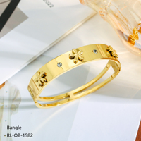 Bracelet en acier inoxydable pour femme, vente en gros d'usine, non décolorant, motif fleur à quatre feuilles, zircon, plaqué or 18 carats