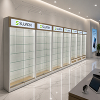 Étagère murale vitrée moderne avec éclairage LED, vitrine en verre trempé avec porte verrouillable et tiroir pour magasin de téléphonie et centre commercial