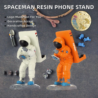 Modèle de statue d'astronaute en résine de style art populaire, support de téléphone de bureau pour les occasions de Noël