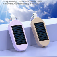 Mini llavero Solar 2 en 1 con borde cruzado, Banco de energía, reloj para teléfono móvil, batería de litio 18650, enchufe incorporado para uso de emergencia