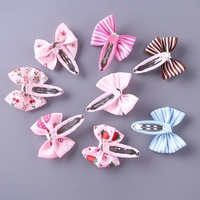 Vente en gros de pinces à cheveux pour enfants personnalisables, classiques, à imprimé floral, avec nœud en ruban, écologiques, multifonctionnelles, en métal et tissu