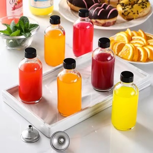 Custom Logo Multifunctional 60ml Sample Boston Bottle Airtight Clear Small Essential Oil Cosmetic Glass Bottles with Lids - Product Image 5