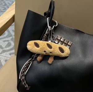 Nuevo Llavero Creativo 2025 con Forma de Nube de Peluche de Chocolate Suave con Luz LED, Colgante de Cuerda Tejida a Mano, Llavero para Coche, Lindo para Mochila - Product Image 6