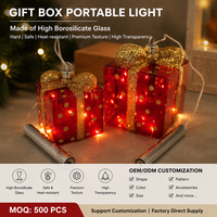 Boîte Cadeau en Verre avec Poignée Lumineuse LED Suspendue, Décoration de Noël, Vente en Gros Fabricant OEM, Rouge Doré, Borosilicate, pour Table