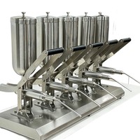 Machine à garnir les gâteaux en acier inoxydable 304 à 5 têtes pour crème et sauce chocolat avec 1 an de service après-vente