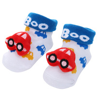 Vente en gros de chaussettes en coton antibactérien antidérapant pour tout-petits, jouet mignon, paquet personnalisé, chaussettes pelucheuses amusantes pour bébés Service OEM disponible
