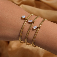 Bijoux en acier inoxydable en gros, plaqué or 18 carats PVD, pendentif en zircon, chaîne en os de serpent, bracelets en zircon pour femmes
