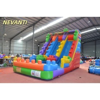 Château gonflable commercial avec toboggan sec et structure de saut pour enfants
