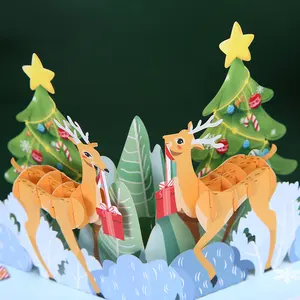 Promoción de regalos Tarjeta de felicitación de Navidad a granel Impreso Navidad Elk papel tallado 3D pop up Tarjetas de regalo de felicitación de Navidad