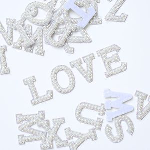 <span class=keywords><strong>Apliques</strong></span> de <span class=keywords><strong>Tela</strong></span> No Tejida con Letras Inglesas de Cristal y Perlas de Imitación Selina, <span class=keywords><strong>para</strong></span> Sombreros, Bolsos, Zapatos, Adhesivos <span class=keywords><strong>para</strong></span> Prendas, 26 Letras - Product Image 2