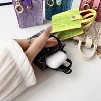 Mini sac antichoc en cuir PU motif peau de serpent, pendentif pour écouteurs, rouge à lèvres, porte-clés de voiture, doux et durable, cadeau pour femme