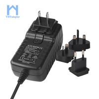 Adaptateur secteur AC à DC 12V 2A Adaptateur d'alimentation mural interchangeable en matériau PC