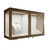 Vitrine de luxe personnalisée pour bijoux, en acier inoxydable, double porte, éclairage LED, finition dorée, robuste, étanche, sécurisée, haute performance