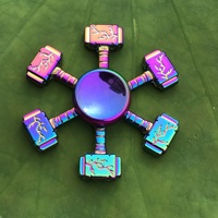 Venta al por mayor de Fidget Spinners clásicos coloridos para aliviar el estrés, con formas de escudo, noria, medalla y pistola, unisex, para mayores de 14 años.