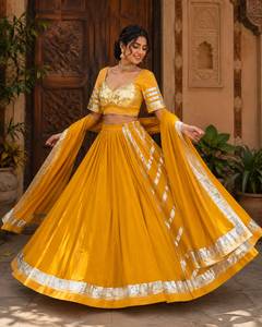 Ensemble Lehenga Choli jaune vif de créateur avec dupatta à bordure Gotta Patti argentée pour la cérémonie Haldi et les occasions festives - Product Image 2