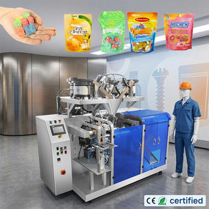 Machine d'emballage automatique de sachets préformés pour fèves de chocolat, avec <span class=keywords><strong>plaque</strong></span> <span class=keywords><strong>vibrante</strong></span> pour le comptage et l'emballage de bonbons durs et mous - Product Image 1