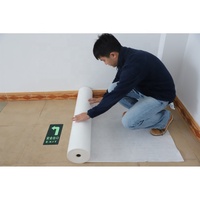 Rouleau de protection de sol temporaire auto-adhésif, anti-poussière et imperméable, pour la construction, fabriqué par un fabricant professionnel