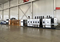 Machine automatique de fabrication de boîtes en carton ondulé avec imprimante flexographique quatre couleurs, plieuse, encollatrice, rainureuse et découpeuse