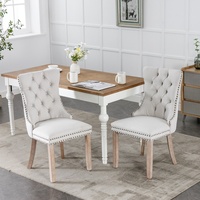 Chaise de salle à manger en tissu de lin, dossier capitonné avec garniture cloutée, pieds en bois de couleur claire, pour salle à manger, lot de 2