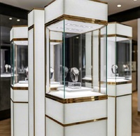 Élégant 360 °   Support d'exposition pour montre, vitrine de luxe en verre blanc et or pour une seule montre de luxe
